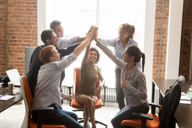HR professional holding an employment handbook
